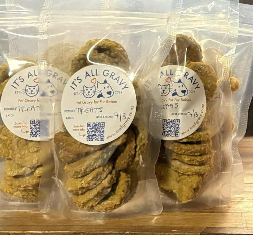Packaged Pet Treats with a picture of a dog and a cat. "Pet Gravy for Fur Babies"