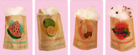 Four bags with fruit illustrations on a pink background